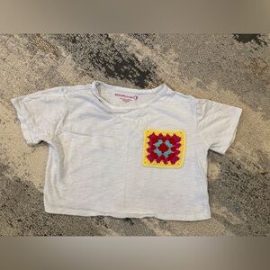 Design History White Tee with Vibrant Crochet Patch